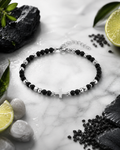 Bracelet PIERRE HOSANNA — croix argentée et perles en pierre naturelle onyx noir mat, vue principale